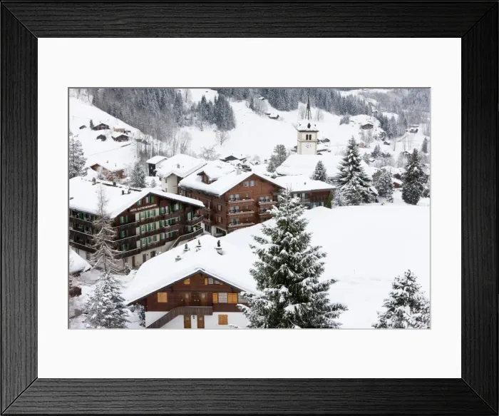 Framed Print : Village and church after a heavy fall of snow, Grindelwald, Jungfrau region Framed Print : Village and church after a heavy fall of snow, Grindelwald, Jungfrau region