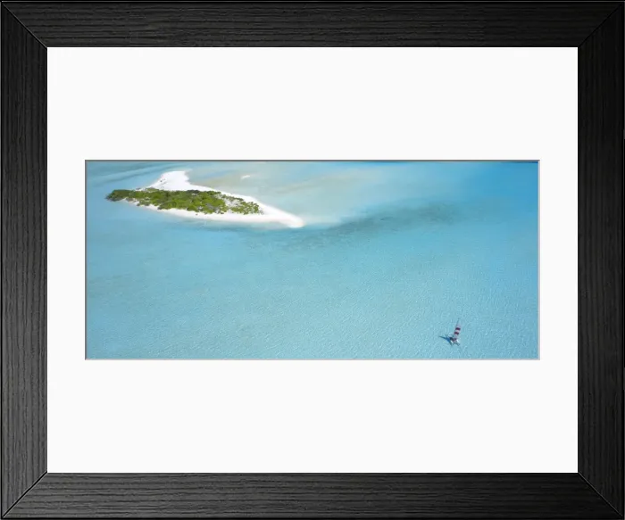 Framed Print : Catamaran sailing near a desert island, the Maldives, Indian Ocean Framed Print : Catamaran sailing near a desert island, the Maldives, Indian Ocean
