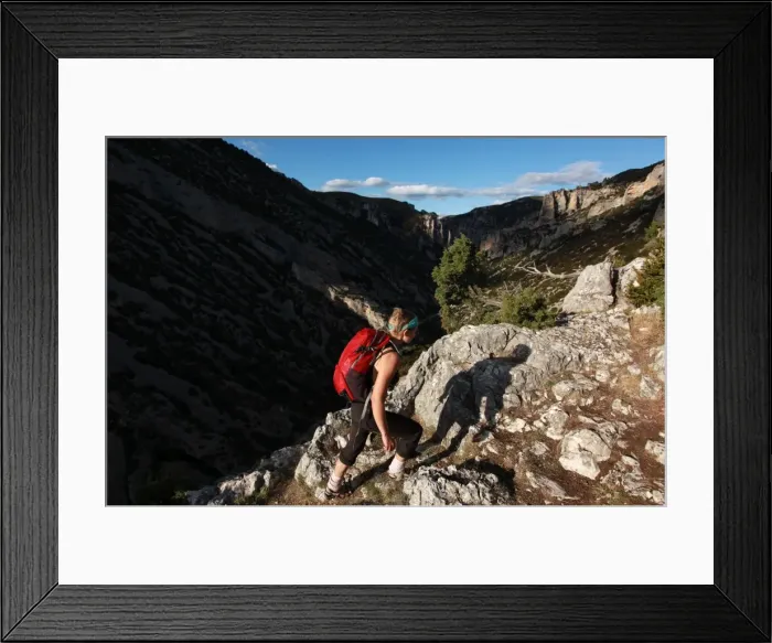 Framed Print : Woman hiking in the Mascun Gorge, one of Europes most popular canyoning destinations Framed Print : Woman hiking in the Mascun Gorge, one of Europes most popular canyoning destinations