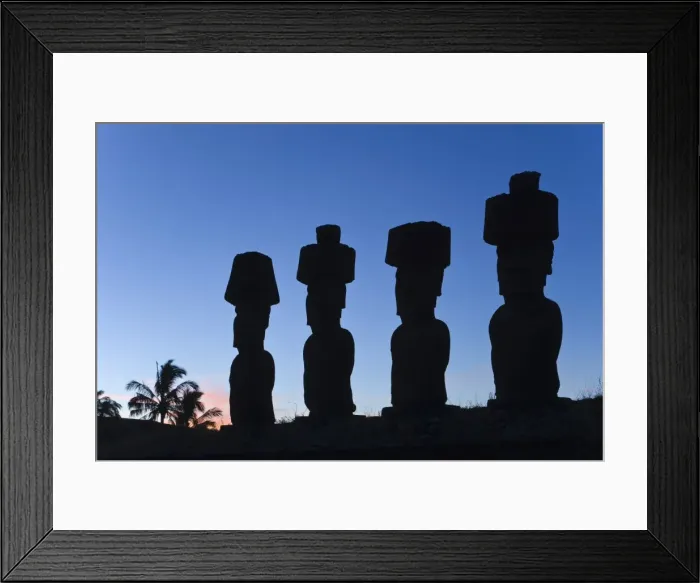 Framed Print : Anakena beach, monolithic giant stone Moai statues of Ahu Nau Nau, four of which have topknots Framed Print : Anakena beach, monolithic giant stone Moai statues of Ahu Nau Nau, four of which have topknots