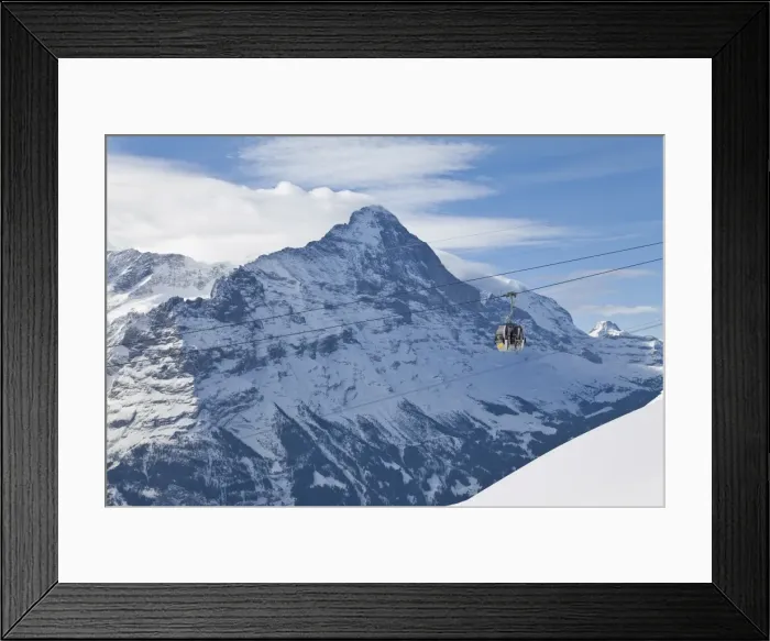 Framed Print : Ski gondola lift in front of the North face of the Eiger mountain, Grindelwald Framed Print : Ski gondola lift in front of the North face of the Eiger mountain, Grindelwald