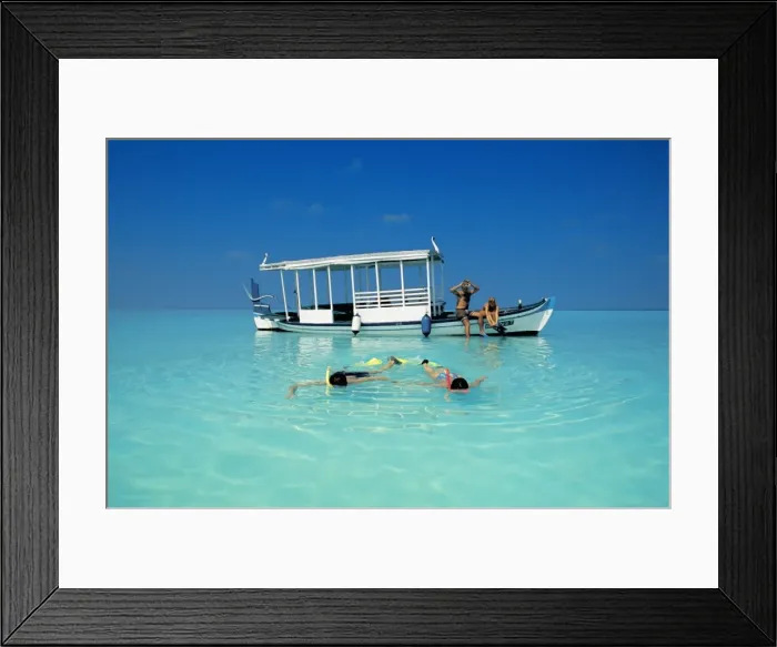 Framed Print : Two couples snorkelling in the Maldives, Indian Ocean, Asia