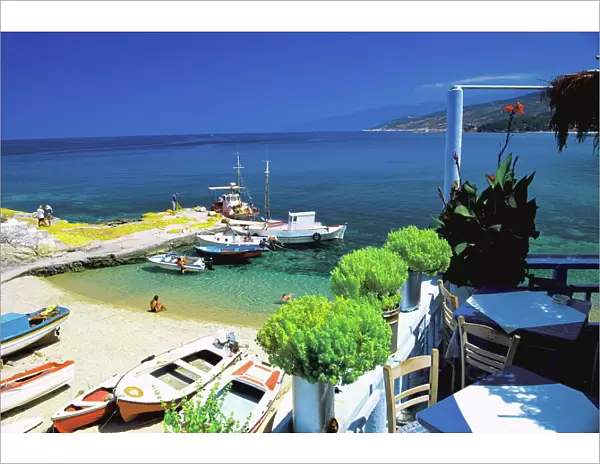 Restaurant overlooking fishermans bay, Ikaria, Greece, Europe