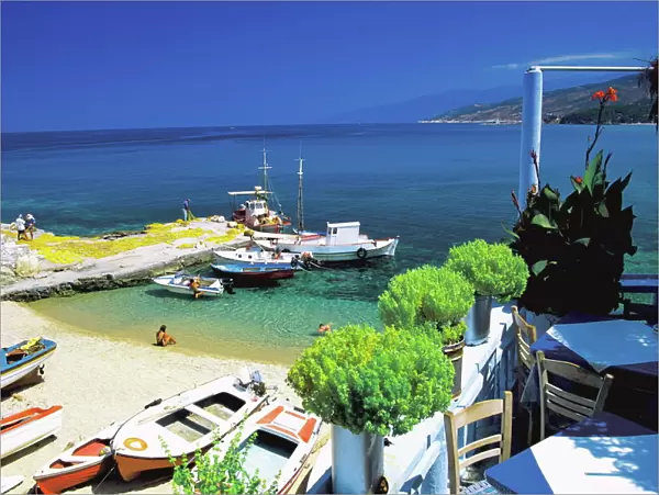 Restaurant overlooking fishermans bay, Ikaria, Greece, Europe