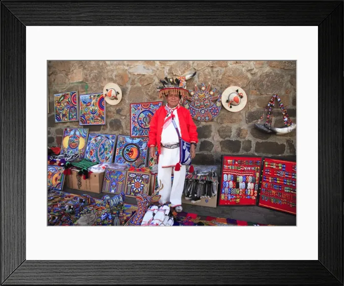 Framed Print : Huichol man selling Huichol handicrafts in the market, Patzcuaro, Michoacan state Framed Print : Huichol man selling Huichol handicrafts in the market, Patzcuaro, Michoacan state