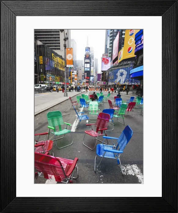 Framed Print : Garden chairs in the road for the public to sit and relax in the pedestrian zone Framed Print : Garden chairs in the road for the public to sit and relax in the pedestrian zone