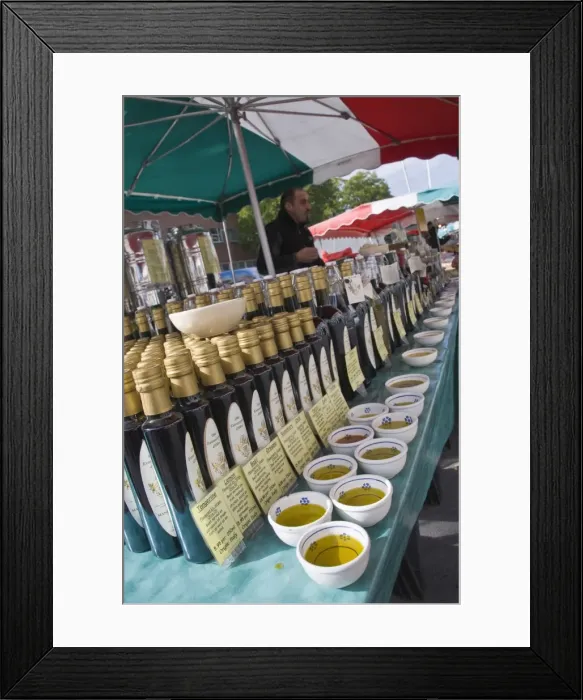Framed Print : Olive oil stall at the Italian market at Walton-on-Thames, Surrey, England Framed Print : Olive oil stall at the Italian market at Walton-on-Thames, Surrey, England