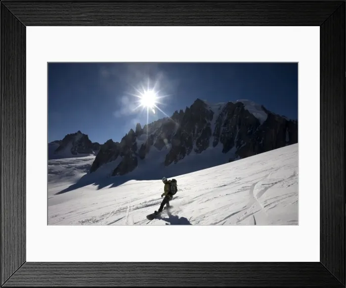 Framed Print : A snowboarder enjoys superb spring snow high on the famous Valley Blanche ski run Framed Print : A snowboarder enjoys superb spring snow high on the famous Valley Blanche ski run