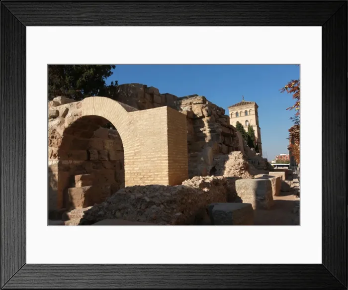 Framed Print : The restored ruins of the Roman city are visible by the River Ebro in the centre of the city of Zaragoza, Aragon, Spain Framed Print : The restored ruins of the Roman city are visible by the River Ebro in the centre of the city of Zaragoza, Aragon, Spain