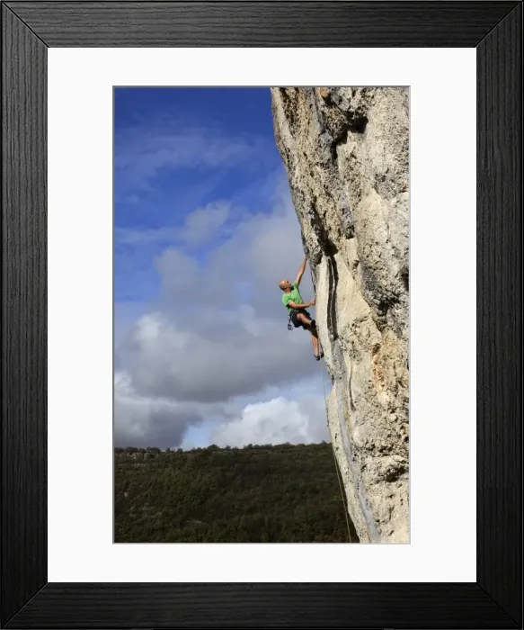 Framed Print : A climber tackles a steep and challenging route on the cliffs of the Aveyron Gorge Framed Print : A climber tackles a steep and challenging route on the cliffs of the Aveyron Gorge