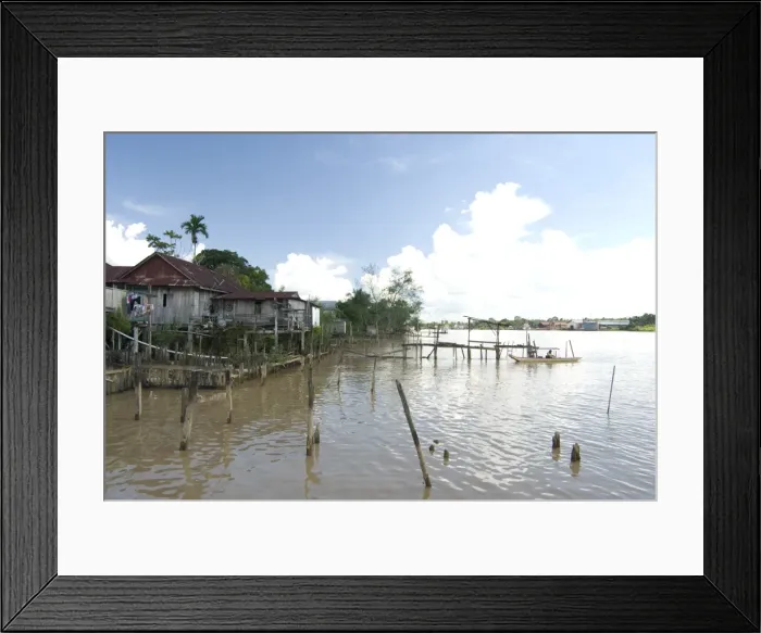 Framed Print : Village of stilted houses on the banks of the Rejang River, Sarakei district Framed Print : Village of stilted houses on the banks of the Rejang River, Sarakei district