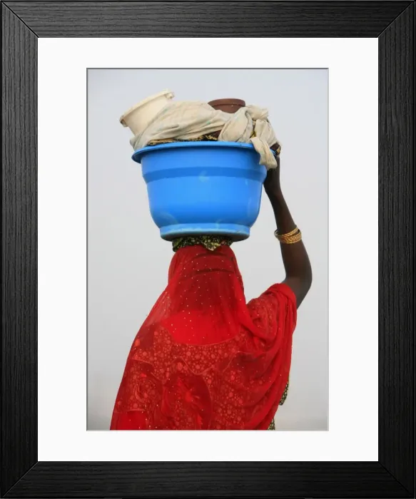 Framed Print : Woman carrying a bowl on her head, Saint Louis, Senegal, West Africa, Africa Framed Print : Woman carrying a bowl on her head, Saint Louis, Senegal, West Africa, Africa