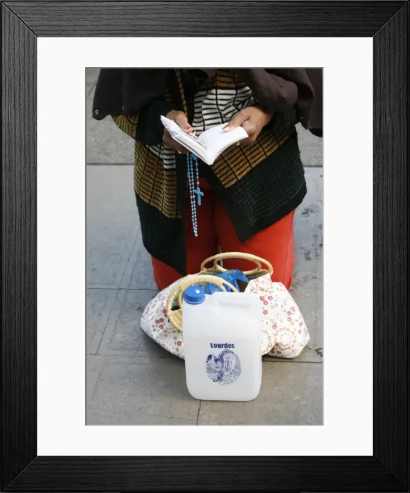 Framed Print : Praying woman with holy water in Lourdes, Lourdes, Hautes Pyrenees, France, Europe Framed Print : Praying woman with holy water in Lourdes, Lourdes, Hautes Pyrenees, France, Europe