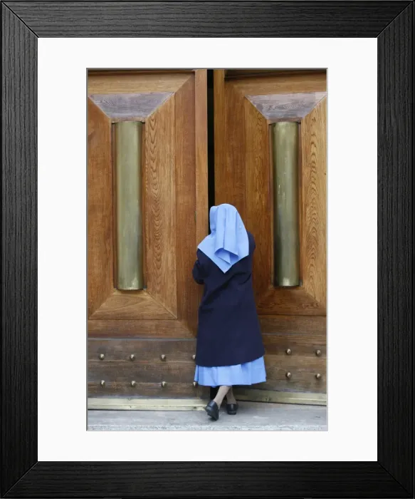 Framed Print : Catholic nun opening a door, Rome, Lazio, Italy, Europe