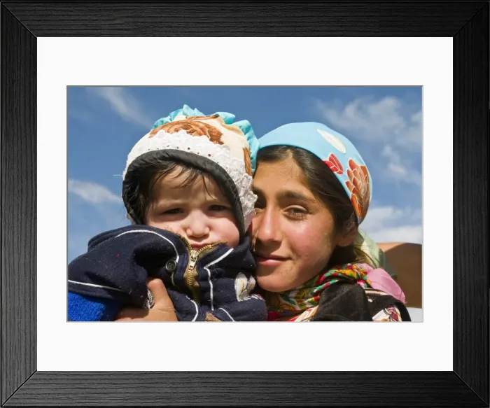 Framed Print : Young Pamir girl holding her little brother, Tajikistan, Central Asia, Asia Framed Print : Young Pamir girl holding her little brother, Tajikistan, Central Asia, Asia
