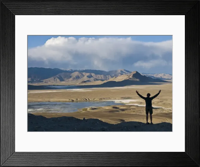 Framed Print : Tourist admiring the stunning scenery of Tuz Kul, Pamir, Tajikistan, Central Asia Framed Print : Tourist admiring the stunning scenery of Tuz Kul, Pamir, Tajikistan, Central Asia