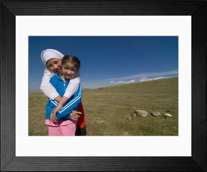 Framed Print : Two girls in a open field near Song Kul, Kyrgyzstan, Central Asia, Asia Framed Print : Two girls in a open field near Song Kul, Kyrgyzstan, Central Asia, Asia
