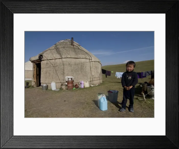 Framed Print : Kyrgyz boy in front of a yurt at Song Kol, Kyrgyzstan, Central Asia, Asia Framed Print : Kyrgyz boy in front of a yurt at Song Kol, Kyrgyzstan, Central Asia, Asia