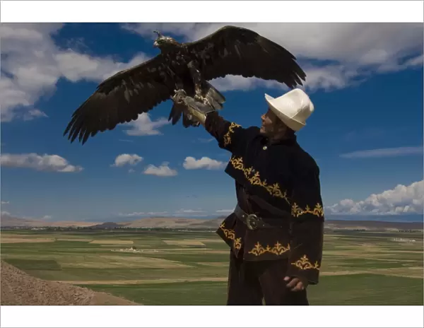 Man with his goshawk, Kyrgyzstan, Central Asia, Asia