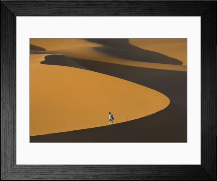Framed Print : Tourist walking along a giant sand dune, Merzouga, Morocco, North Africa, Africa Framed Print : Tourist walking along a giant sand dune, Merzouga, Morocco, North Africa, Africa