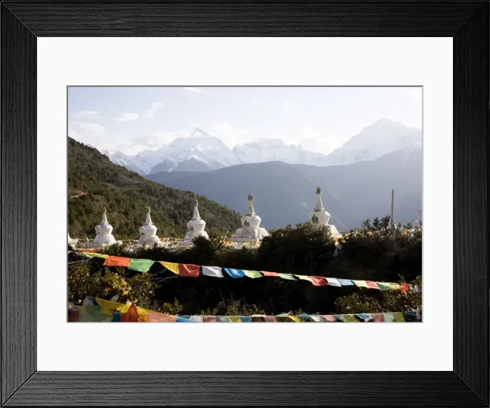 Framed Print : Buddhist stupas with Meili Snow Mountain peak in background, en route to the Tibetan border Framed Print : Buddhist stupas with Meili Snow Mountain peak in background, en route to the Tibetan border