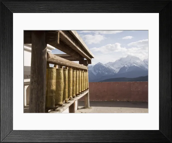 Framed Print : Prayer wheels with Meili Snow Mountain peak in the background, en route to Deqin Framed Print : Prayer wheels with Meili Snow Mountain peak in the background, en route to Deqin