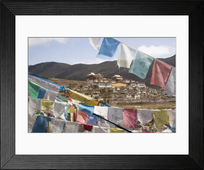 Framed Print : Prayer flags and Ganden Sumsteling Gompa (Gandan Sumtseling) (Songzanlin Si) Buddhist Monastery Framed Print : Prayer flags and Ganden Sumsteling Gompa (Gandan Sumtseling) (Songzanlin Si) Buddhist Monastery