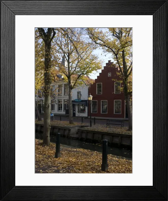Framed Print : Houses along the canal, Edam, Netherlands, Europe Framed Print : Houses along the canal, Edam, Netherlands, Europe