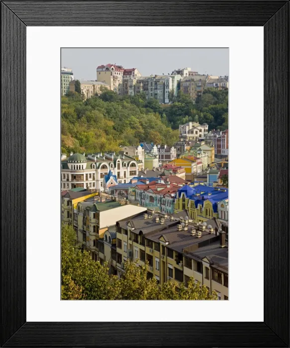 Framed Print : Elevated view over colourful buildings with multicolor roofs in a new residential area of Kiev Framed Print : Elevated view over colourful buildings with multicolor roofs in a new residential area of Kiev