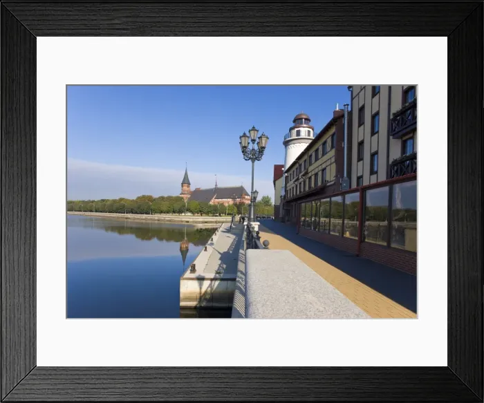 Framed Print : Cathedral and Fish Village, a modern housing, hotel and restaurant development Framed Print : Cathedral and Fish Village, a modern housing, hotel and restaurant development
