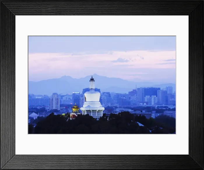 Framed Print : An illuminated White Pagoda and city buildings at sunset, Beihai park, Beijing Framed Print : An illuminated White Pagoda and city buildings at sunset, Beihai park, Beijing