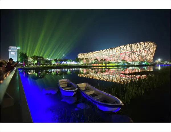 A night time light show at the Birds Nest National Stadium during the 2008 Olympic Games