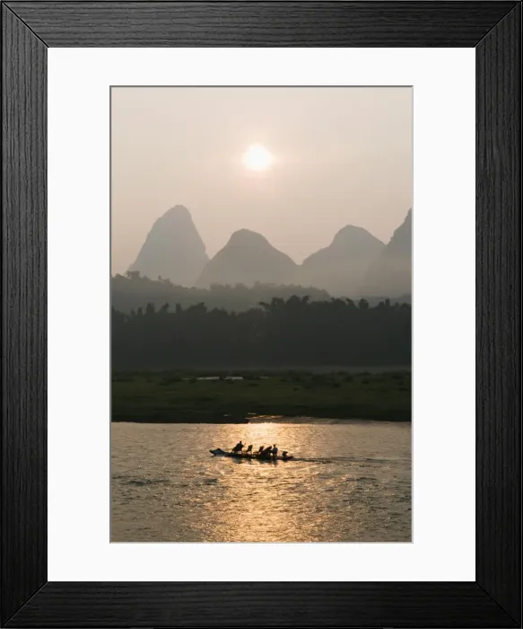 Framed Print : Tourist boat sailing through karst scenery at sunrise on the Li river Framed Print : Tourist boat sailing through karst scenery at sunrise on the Li river