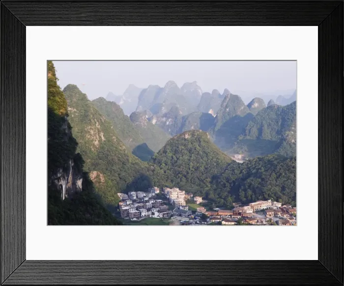 Framed Print : Karst limestone scenery surrounding a village in Yangshuo, near Guilin Framed Print : Karst limestone scenery surrounding a village in Yangshuo, near Guilin