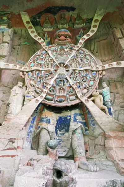 Tibetan Buddhist wheel of life rock sculpture at Dazu Rock Carvings, UNESCO World Heritage Site