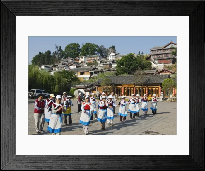 Framed Print : Naxi women dancing in Lijiang Old Town, UNESCO World Heritage Site, Yunnan Province Framed Print : Naxi women dancing in Lijiang Old Town, UNESCO World Heritage Site, Yunnan Province