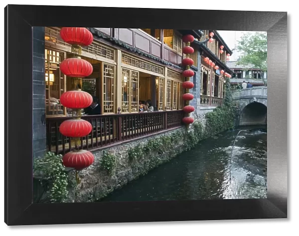 Traditional architecture of riverside restaurant in Lijiang Old Town, Lijiang