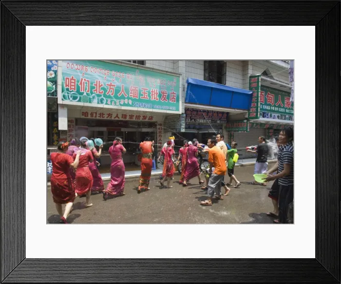 Framed Print : Water Splashing Festival in Jinghong town Xishuangbanna, Yunnan province, China, Asia Framed Print : Water Splashing Festival in Jinghong town Xishuangbanna, Yunnan province, China, Asia