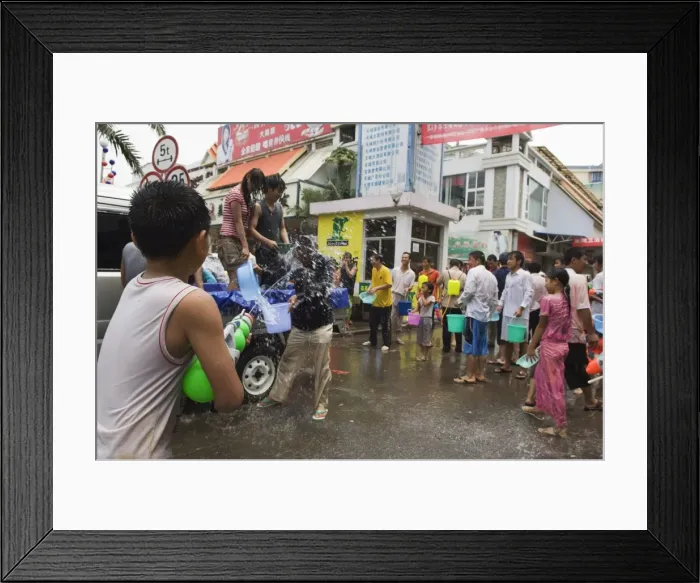 Framed Print : Water Splashing Festival in Jinghong town Xishuangbanna, Yunnan province, China, Asia Framed Print : Water Splashing Festival in Jinghong town Xishuangbanna, Yunnan province, China, Asia