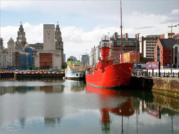The red lightship at Canning Dock next to Albert Dock with the Liver building in the background