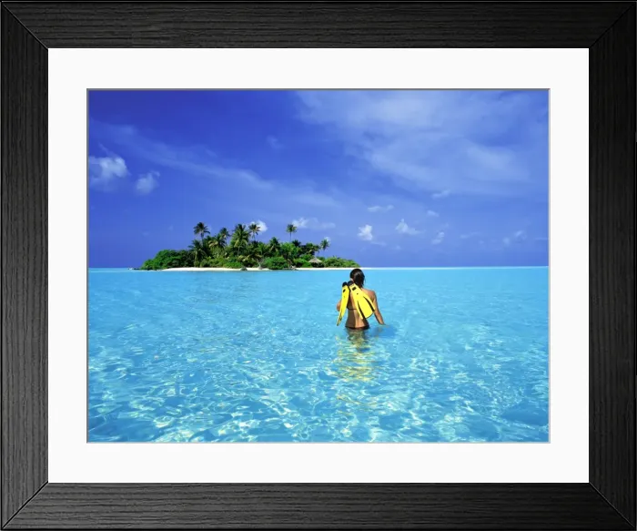 Framed Print : Woman walking with snorkelling equipment to Rihiveli island, Maldives, Indian Ocean, Asia Framed Print : Woman walking with snorkelling equipment to Rihiveli island, Maldives, Indian Ocean, Asia
