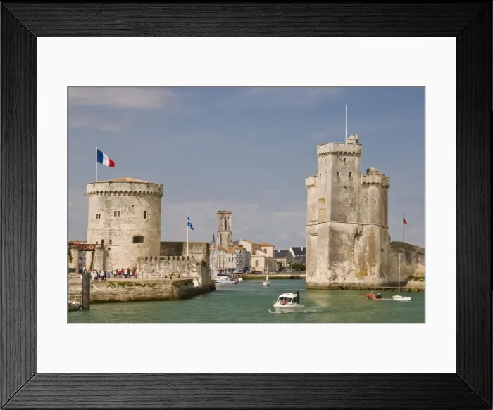 Framed Print : The towers of La Chaine and St. Nicholas at the entrance to the ancient port of La Rochelle Framed Print : The towers of La Chaine and St. Nicholas at the entrance to the ancient port of La Rochelle