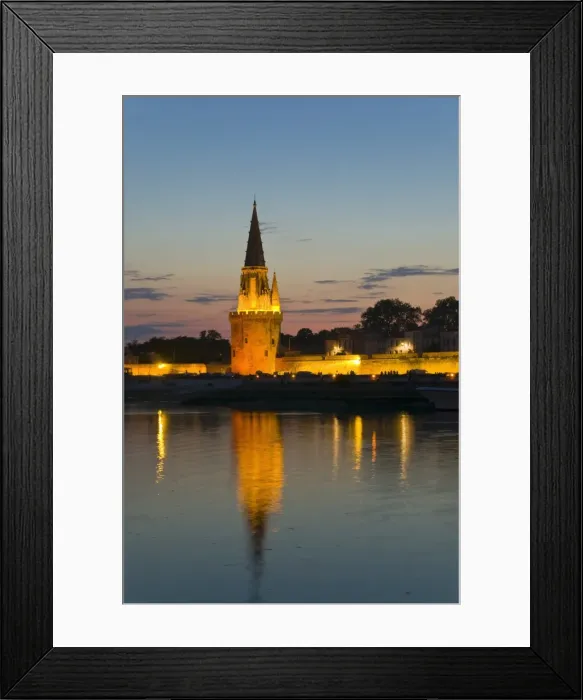 Framed Print : Old prison tower seen across the harbour entrance at dusk, La Rochelle Framed Print : Old prison tower seen across the harbour entrance at dusk, La Rochelle