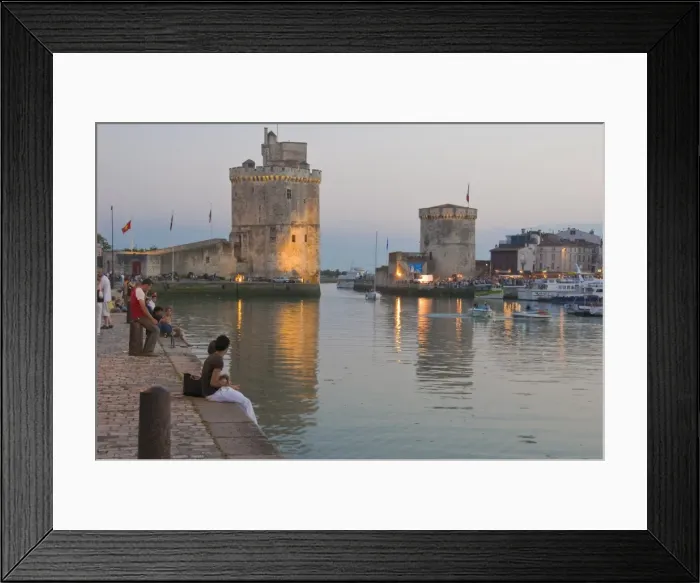 Framed Print : Couple sitting on the harbour-side at La Rochelle, Charente-Maritime, France, Europe Framed Print : Couple sitting on the harbour-side at La Rochelle, Charente-Maritime, France, Europe