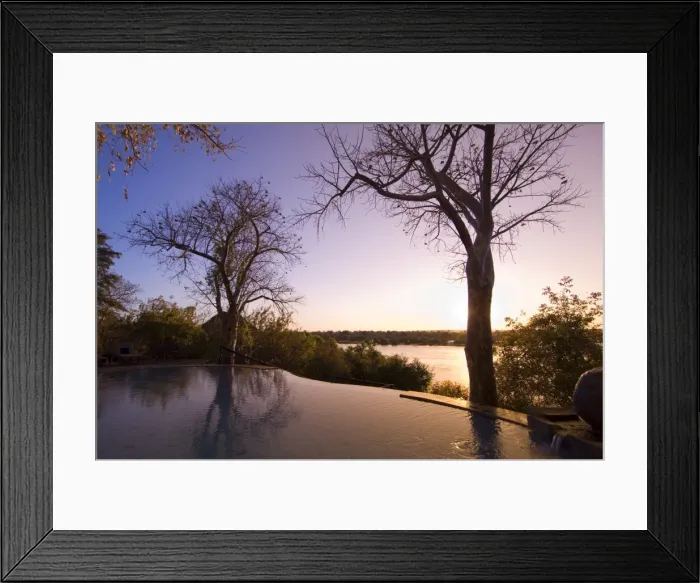 Framed Print : The River Club lodge, sunset on Zambesi River, Zambia, Africa Framed Print : The River Club lodge, sunset on Zambesi River, Zambia, Africa