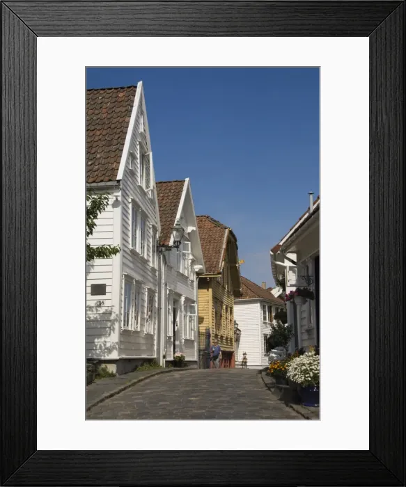 Framed Print : A street of wooden houses in the old town area adjacent to the harbour Framed Print : A street of wooden houses in the old town area adjacent to the harbour