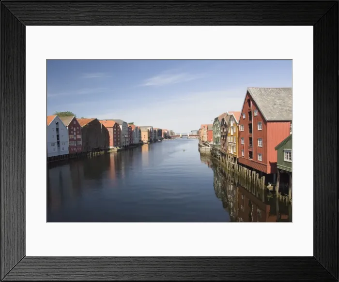 Framed Print : The Nidelva with merchants warehouses each side leading to the old dock area Framed Print : The Nidelva with merchants warehouses each side leading to the old dock area