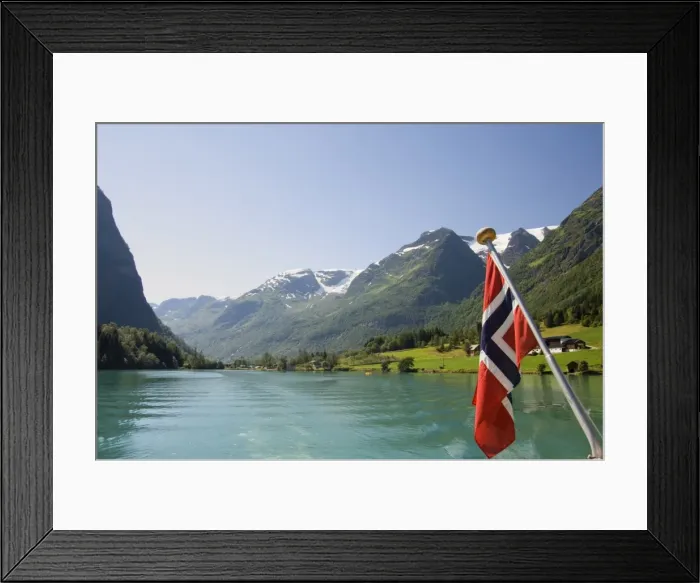 Framed Print : Sailing on the green lake and Norwegian flag, Olden, Fjordland, Norway Framed Print : Sailing on the green lake and Norwegian flag, Olden, Fjordland, Norway