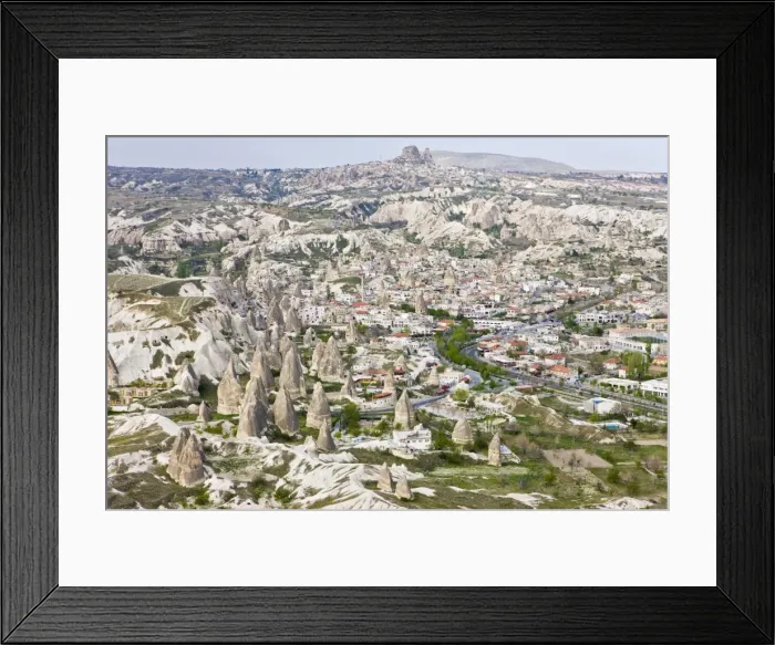 Framed Print : Aerial of the town of Goreme with the Rock Castle of Uchisar on the horizon Framed Print : Aerial of the town of Goreme with the Rock Castle of Uchisar on the horizon