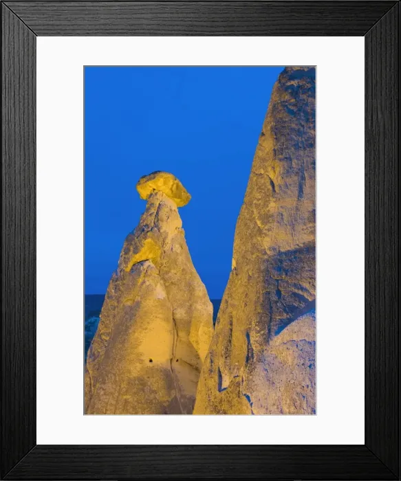 Framed Print : Fairy chimneys known as The Three Beauties illuminated at night near Goreme Framed Print : Fairy chimneys known as The Three Beauties illuminated at night near Goreme